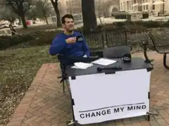 man sitting at change my mind table outdoors