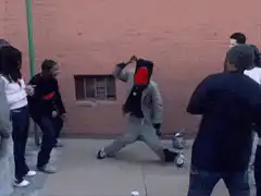 Man in red beanie dancing in circle