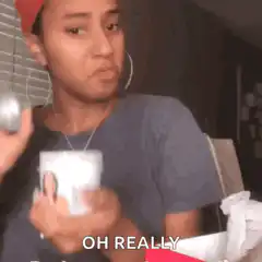 Woman with red headwrap says oh really