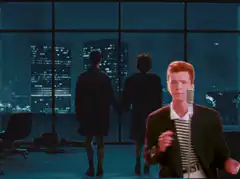 Rick Astley singing in front of a city skyline