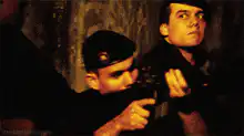 Soldiers in a tunnel with guns