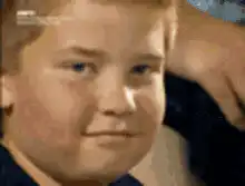 Boy smirking and nodding