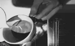 Pouring milk into a portafilter