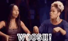Two women doing the woosh dance