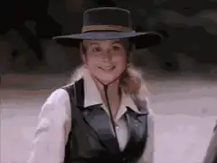 Woman in hat smiling
