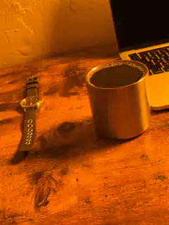 coffee cup on wooden desk