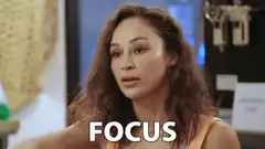 Woman pointing finger with text FOCUS