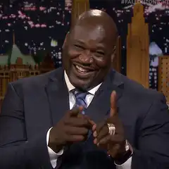 Shaquille O'Neal pointing and laughing