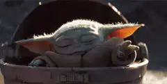 Baby Yoda sleeping in his pram