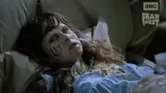 Zombie girl lying in bed