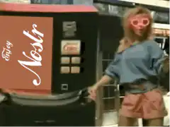 Woman dancing next to Nostr vending machine