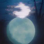 glowing moon with clouds