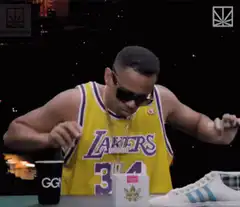Man in Lakers jersey zaps joint