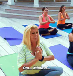 Woman meditating saying om mimosa