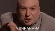 Bald man laughing evilly