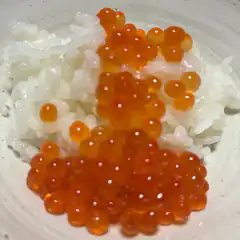 orange fish roe on white rice