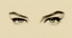 Green eyes blink