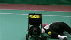 Man gets hit in the face by a tennis ball