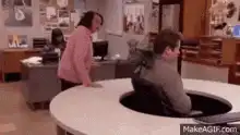 Andy Dwyer stuck in the desk hole