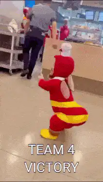 Man in bee costume dancing