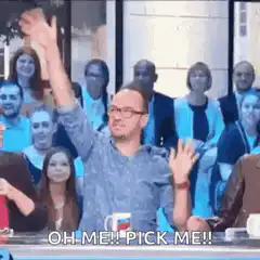 Man raising hand shouting pick me
