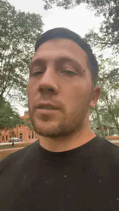 man looking around outdoors