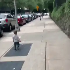 Toddler runs to hug his friend
