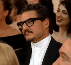 Pedro Pascal pointing finger then smiling