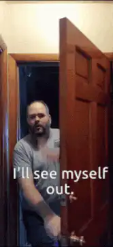 Man waves goodbye from doorway