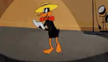 Daffy Duck bowing on stage