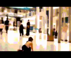 Blurred mall interior with people