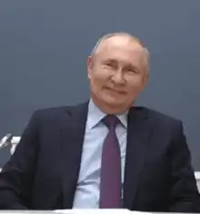 Vladimir Putin waving