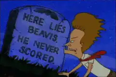 Beavis looking at his own tombstone