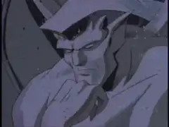Demona transforms into a dragon