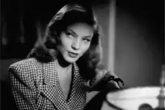 Lauren Bacall looking down