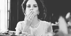 Lana Del Rey blowing a kiss