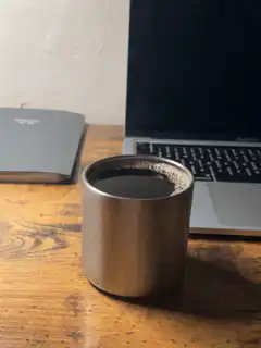 steam rising from coffee cup