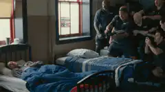 Man spits water on sleeping roommate