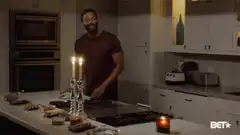Man welcomes home with food and candles