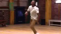 Man breakdancing in studio