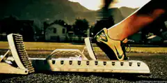 Runner in starting blocks