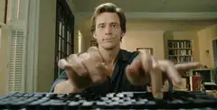 Jim Carrey typing with his fingers