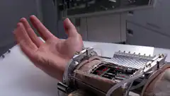 Robotic hand flexing fingers