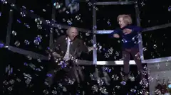 Two men dancing in bubbles