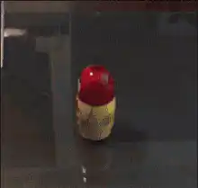 Hands opening a matryoshka doll