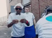 Man in chef hat counting money