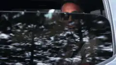 Vin Diesel lifts sunglasses in car