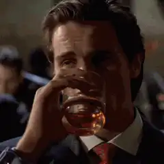 Christian Bale drinking whiskey