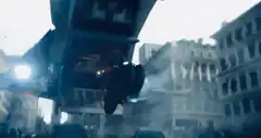 Batman on Batpod in city chase