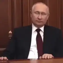 Vladimir Putin nodding